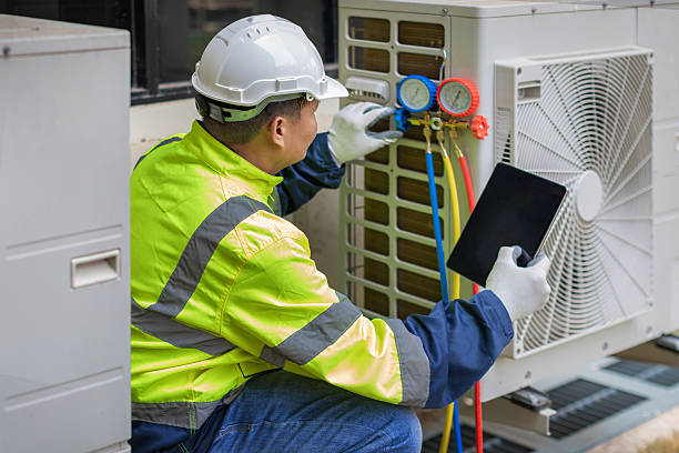 Professional Heat Pump Repair technician working in Ovid, NY